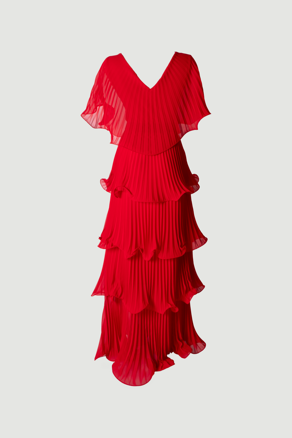 Red Astra evening gown detail showing tiered pleated chiffon texture