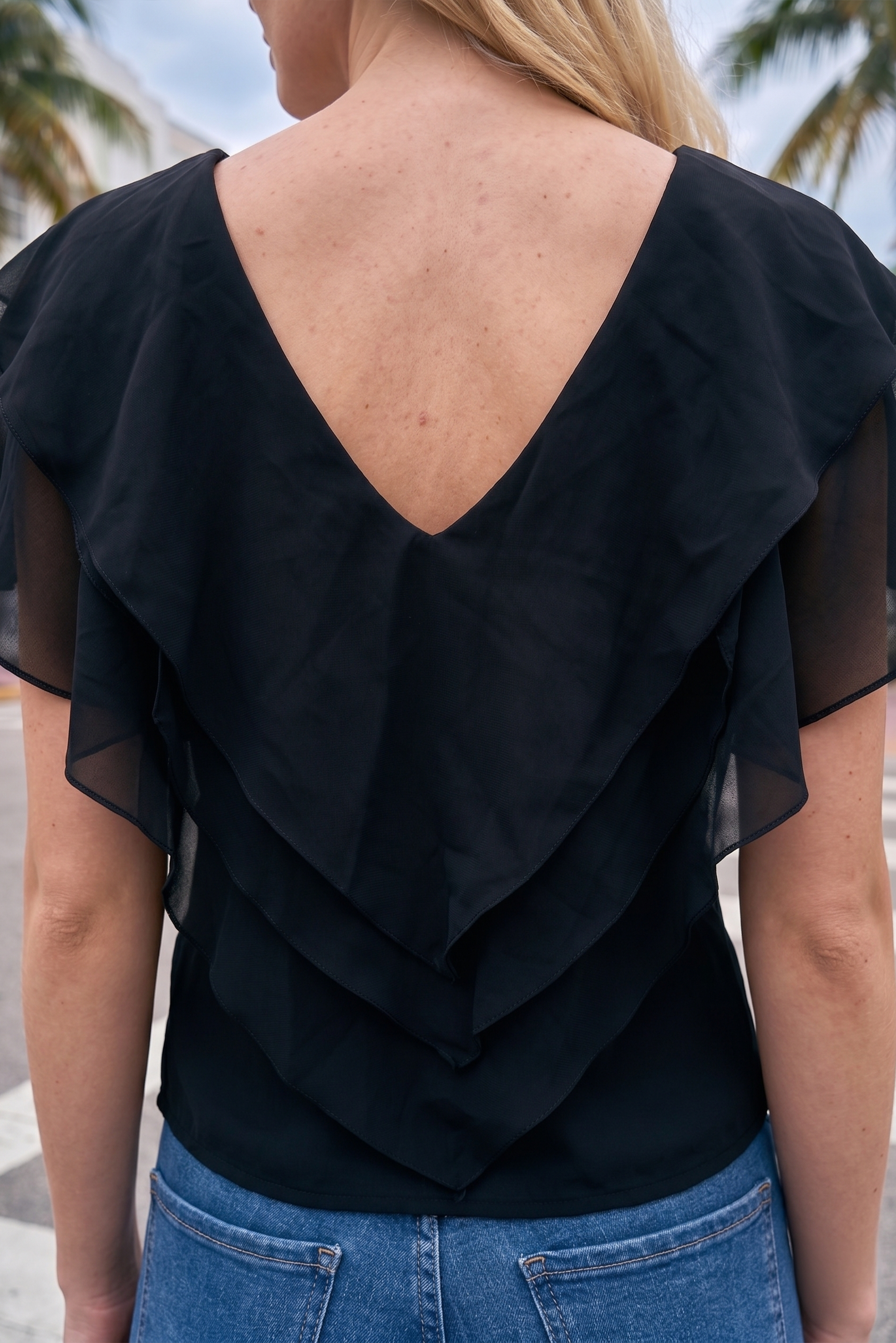 Limsa Club Ciel V-Neck Chiffon Blouse in Black — close-up detail