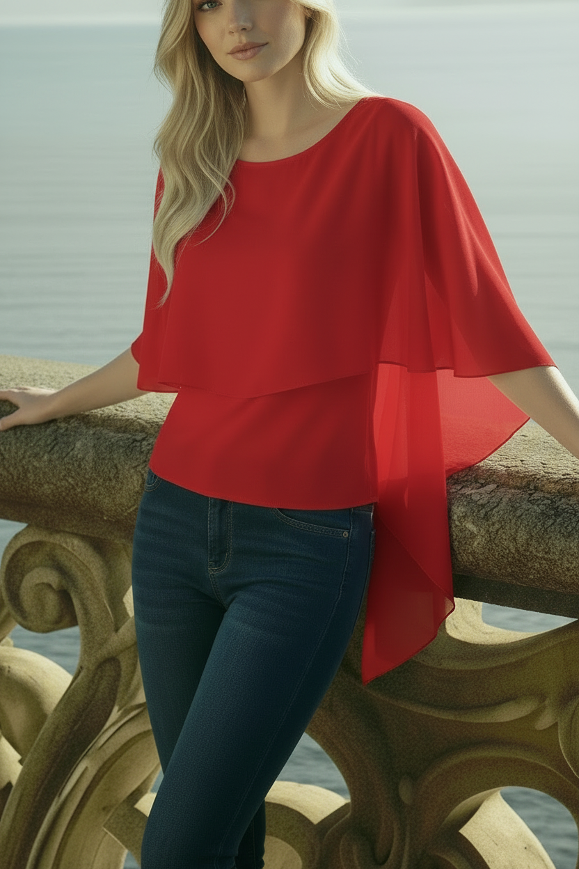 Close-up of red ruffle chiffon blouse cape-like volan and shoulder draping