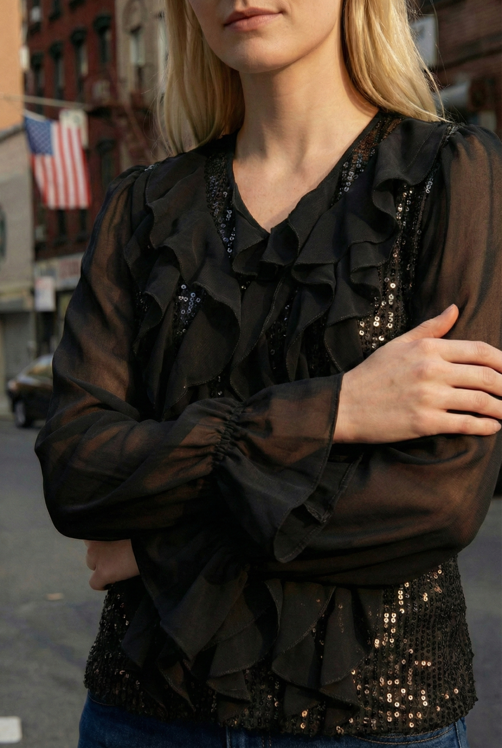 Limsa Club Azura Sequin Ruffle Blouse in Black — close-up detail