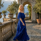 Limsa Club Seraphine Off-Shoulder Evening Gown in Sax Blue — back view