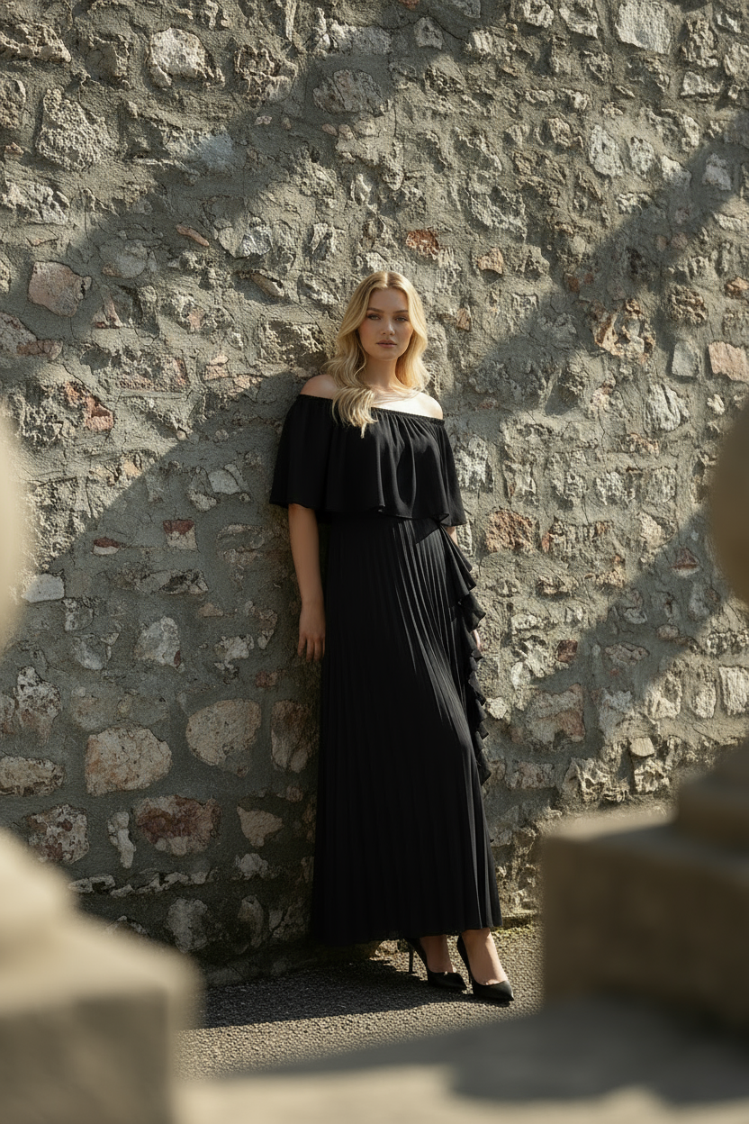 Black Daila dress front view showing elegant chiffon flow and silhouette