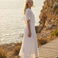 Limsa Club Solena V-Neck Cape Evening Dress in Bone — back view