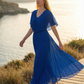 Limsa Club Solena V-Neck Cape Evening Dress in Sax Blue — back view
