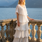 Limsa Club Astra V-Neck Pleated Evening Gown in Bone — front view