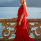 Limsa Club Astra V-Neck Pleated Evening Gown in Red — back view