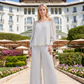 Limsa Club Carmina Off-Shoulder Palazzo Jumpsuit in Bone — front view