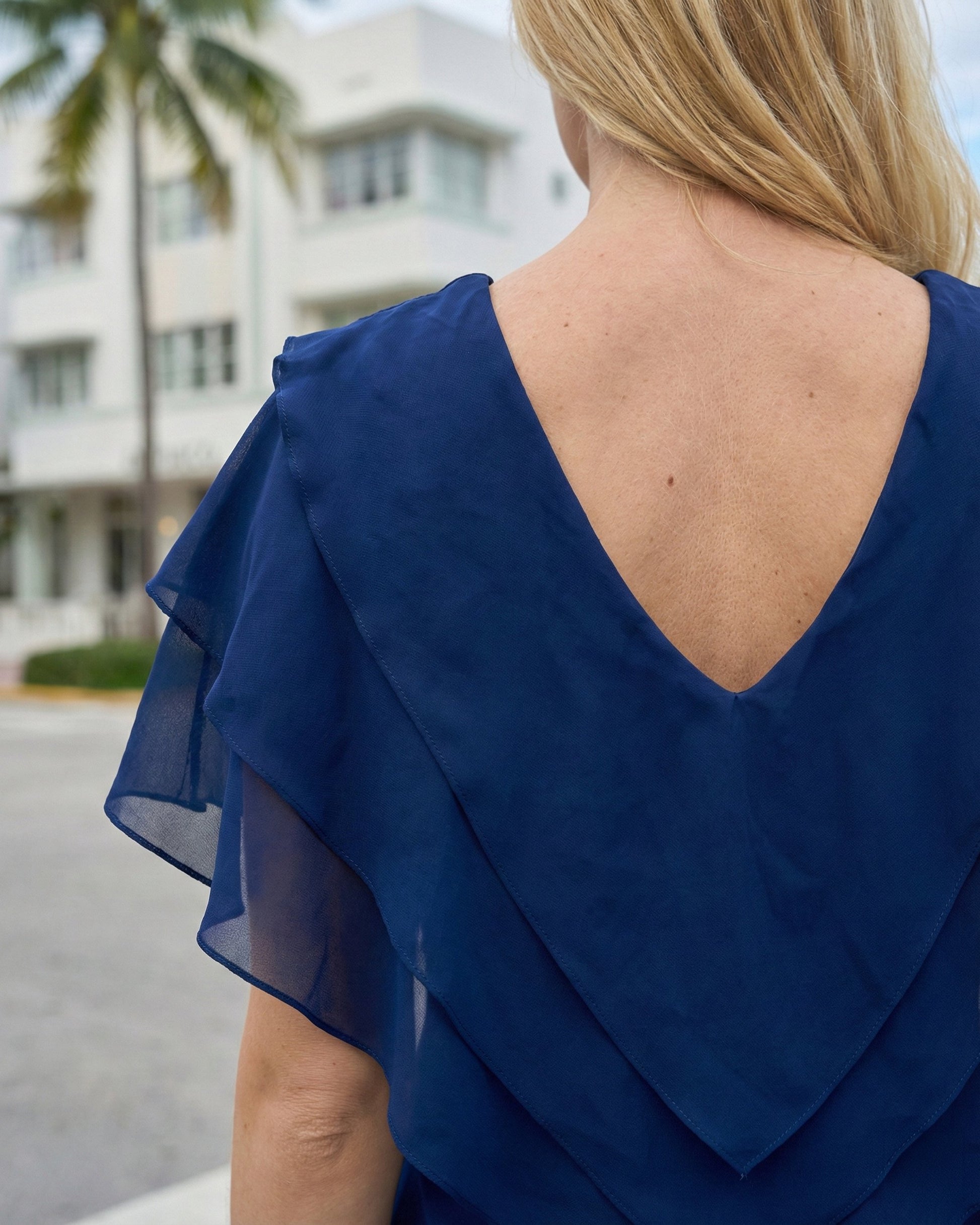 Limsa Club Ciel Chiffon V-Neck Blouse in Sax Blue — close-up detail