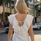 Limsa Club Cora Chiffon V-Neck Blouse in Bone — close-up detail