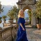 Limsa Club Seraphine Off-Shoulder Evening Gown in Sax Blue — back view